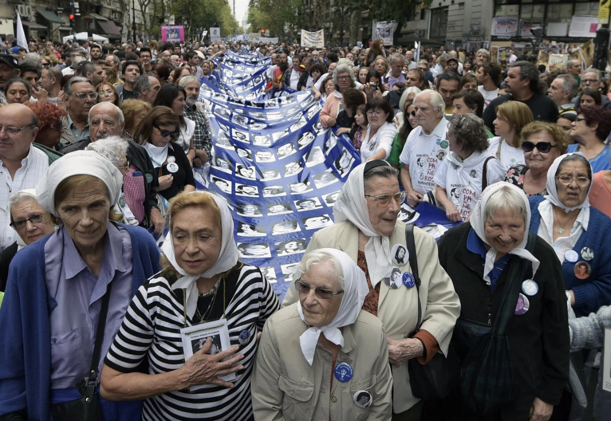 Members of the Grandmothers of Plaza de Mayo gather in Buenos Aires on December 19, 2011, as the Argentine Congress recognized the rights group on its 35th anniversary. (AFP)