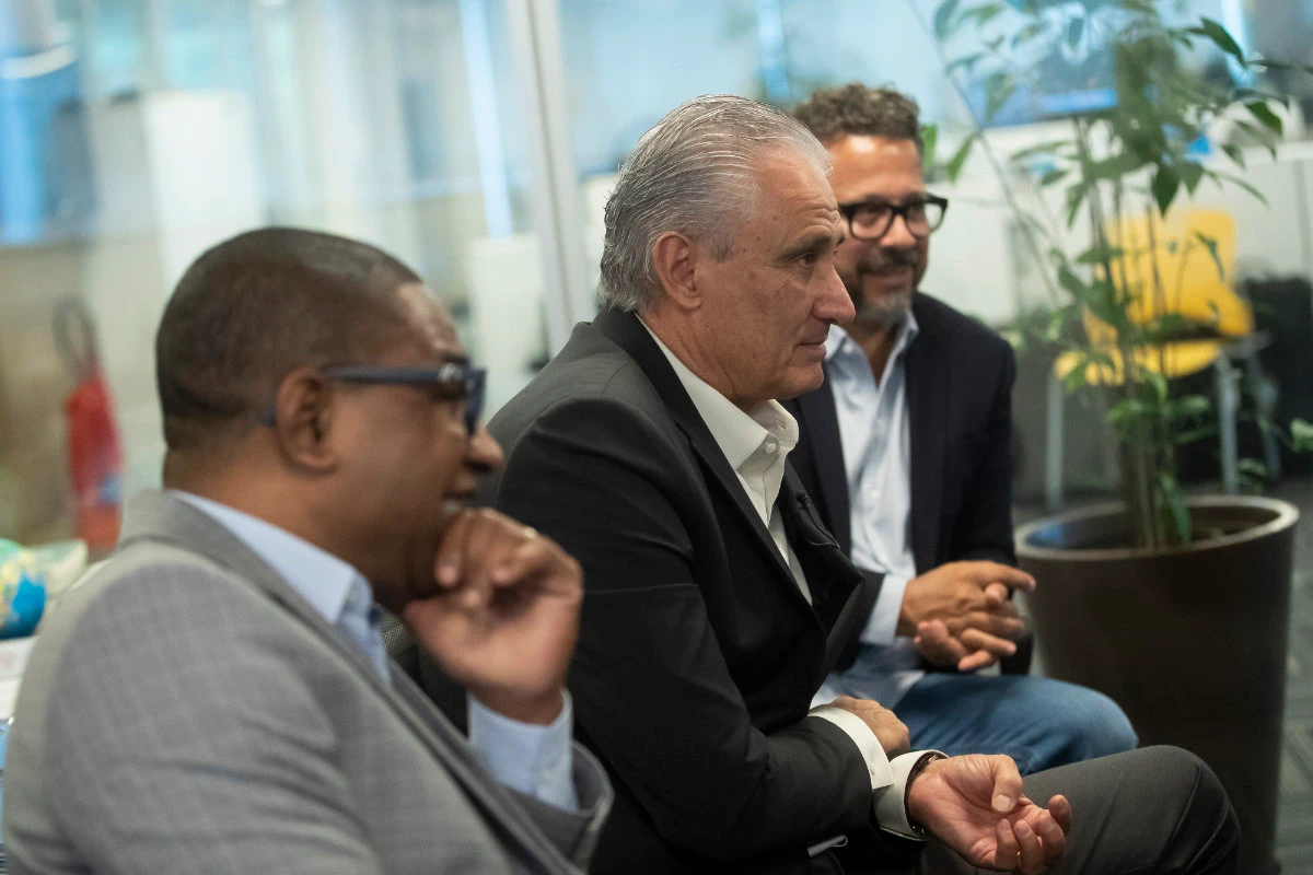 Brazil's national soccer coach Adenor Leonardo Bachi, center, assistant coaches Cesar Sampaio, left, and Cleber Xavier give an interview in Rio de Janeiro on Thursday. (AP)