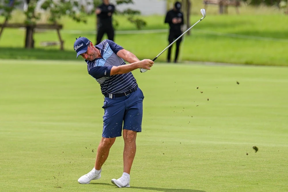 Richard Bland from England plays a shot on the 12th hole during LIV Golf Invitational Bangkok 2022 at Stonehill Golf Club in Pathum Thani, Thailand, Friday. (AP)