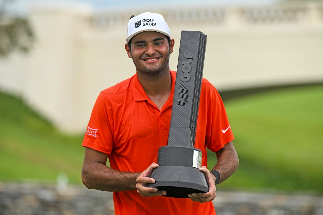 Eugenio Lopez-Chacarra from Spain with the winner's trophy after his victory at the LIV Golf Invitational Bangkok 2022. (AP)