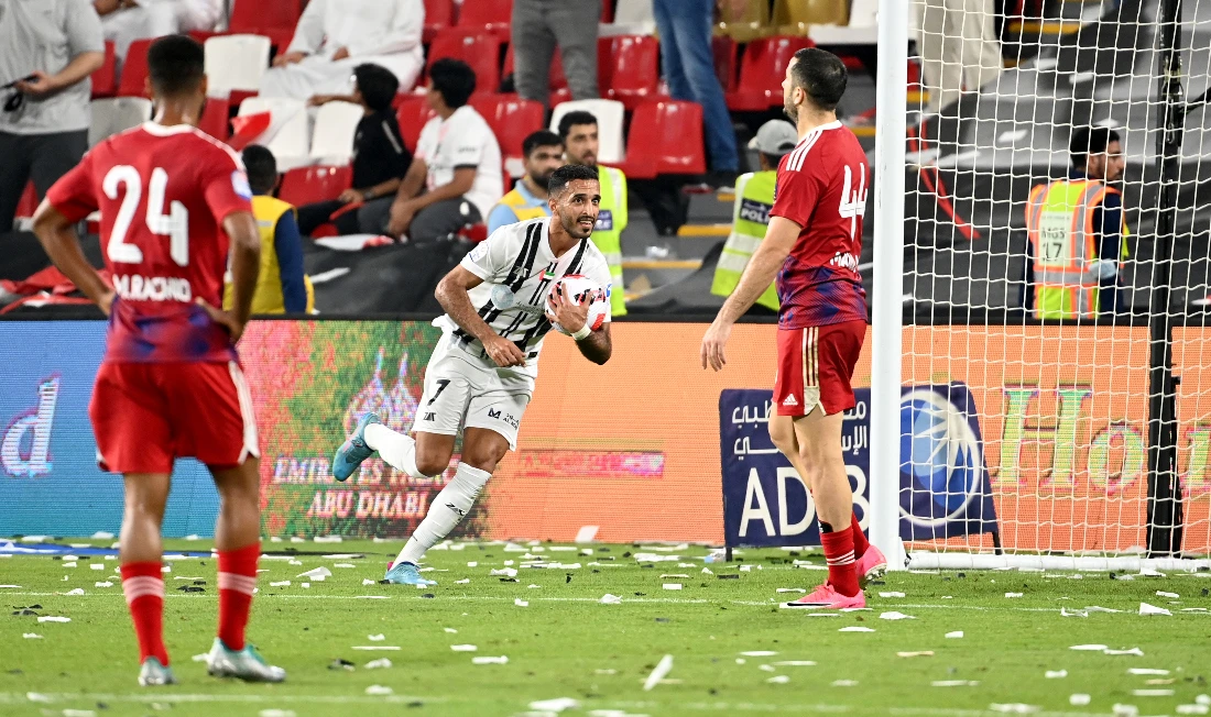 Al-Jazira's Ali Mabkhout celebrates scoring in the 3-3 draw against Sharjah. (Supplied)