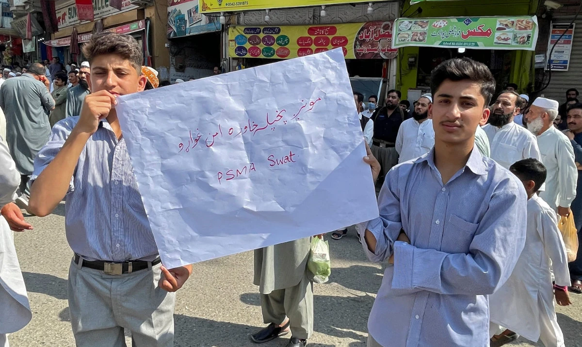 Students and teachers of private schools take part in a protest against recent attack in Mingora on October 10, 2022. (AFP)
