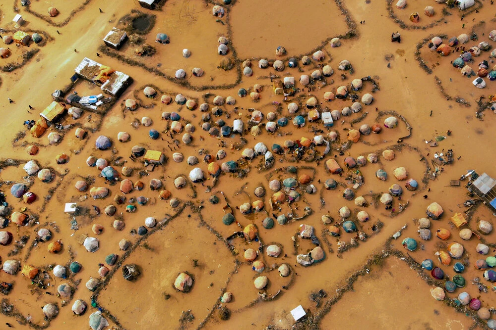 Huts made of branches and cloth provide shelter to Somalis displaced by drought on the outskirts of Dollow, Somalia, in September 2022. (AP)