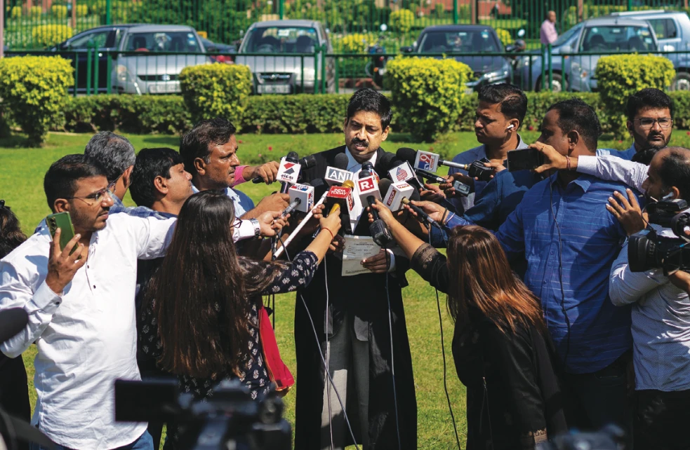 Aftab Ali Khan, a lawyer representing one of the petitioners, speaks at press briefing at the Supreme Court premises in New Delhi on Thursday. (AP)