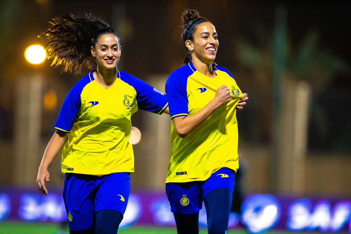 Al-Nassr players celebrate during their win over Sama in the first ever Saudi Women's Premier League match. (SAFF)