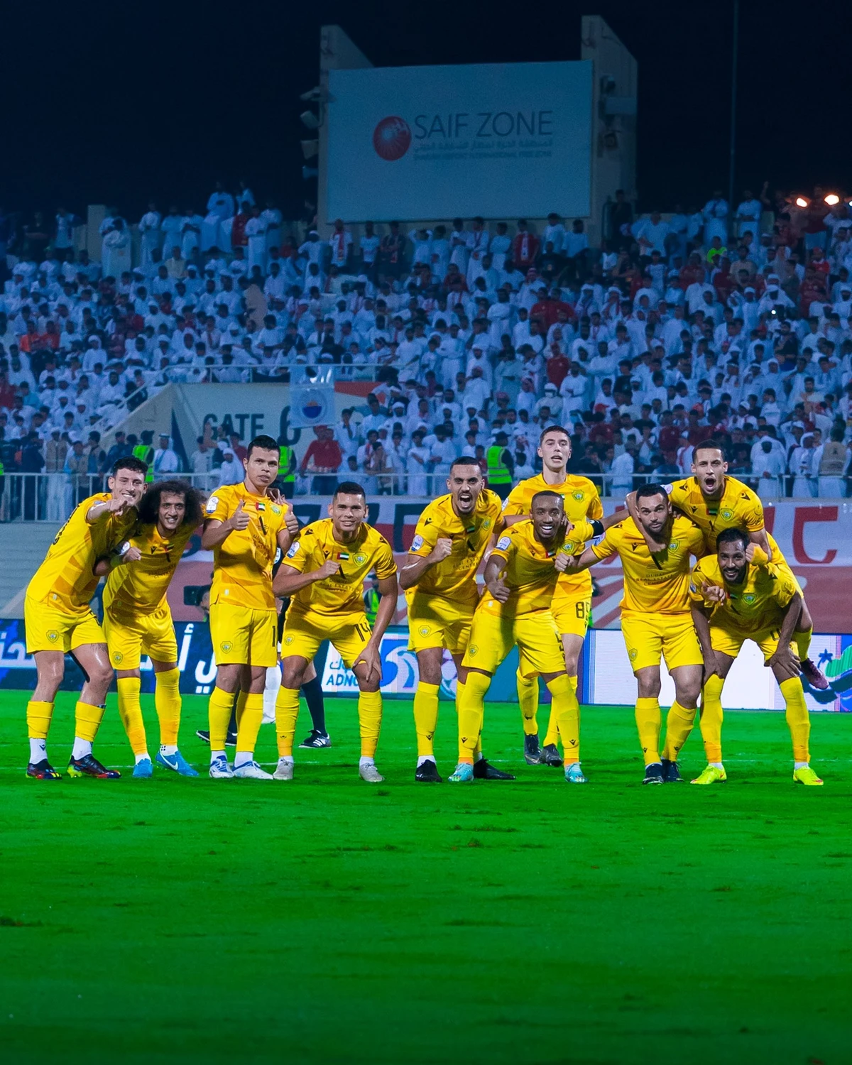 Al-Wasl players celebrate going top of the UAE Pro League table after win over Sharjah. (Twitter: @AlWaslSC)