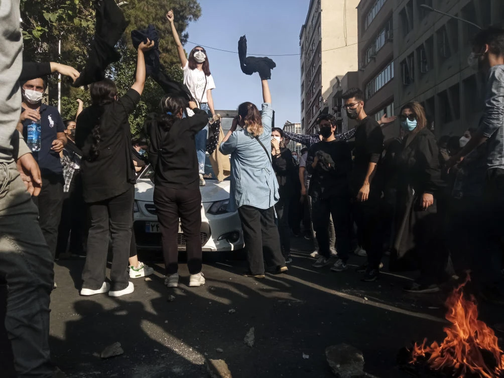 Iranian women protest Mahsa Amini’s death after she was detained by the morality police, in Tehran, on Oct. 1, 2022. in this photo taken by an individual not employed by AP and obtained by the AP outside Iran. (AP)