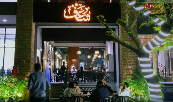 This photo taken on October 11, 2022 shows visitors at a UAE-based coffee shop in Islamabad, Pakistan. (Screengrab)