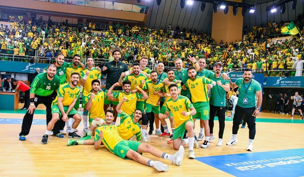 Al-Khaleej players celebrate their win over Sydney Uni. (Twitter/@sahfksa_en)