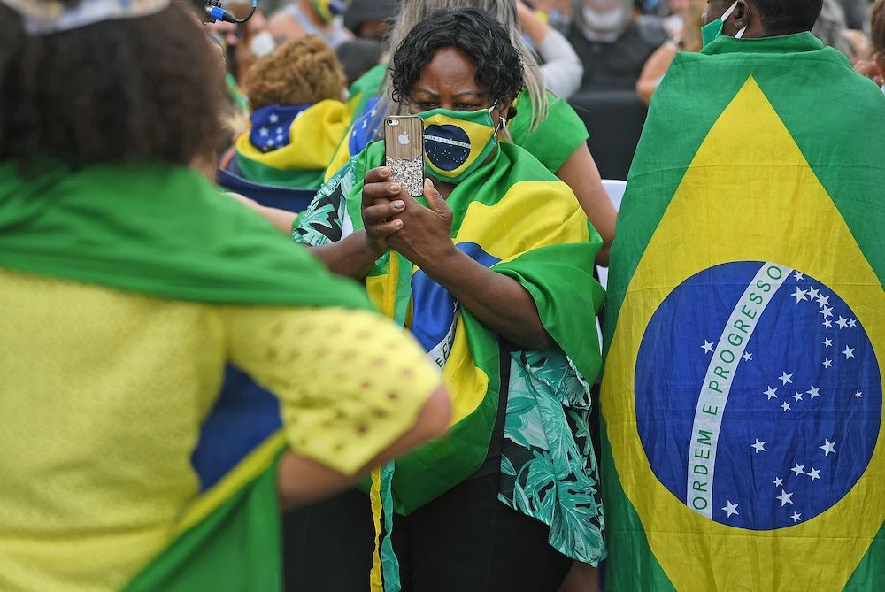 The flag and the ‘verde-amarela’ (green-yellow) T-shirt became symbols of President Jair Bolsonaro, who will face former president Luiz Inacio Lula da Silva on the ballot on Oct. 30, 2022. (AFP)