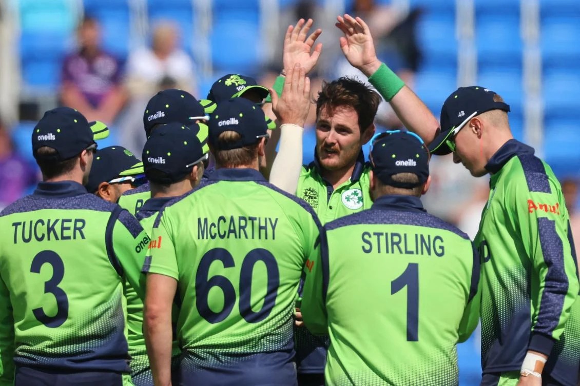 Ireland’s Mark Adair (C) celebrates his wicket of Scotland’s George Munsey with teammates during the ICC men’s Twenty20 World Cup 2022 cricket match between Ireland and Scotland at Bellerive Oval in Hobart on October 19, 2022. (AFP)