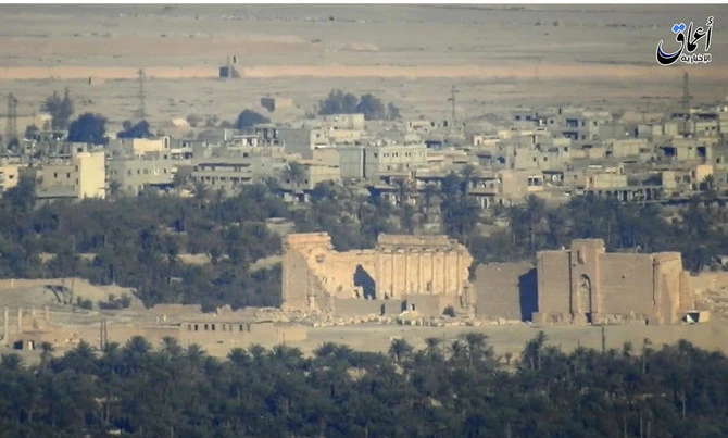 A dozen bodies found in Syria mass grave: state media