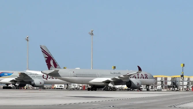 In this file photo taken on April 1, 2020, a Qatar Airways Airbus A350-941 aircraft is seen on the tarmac at Hamad International Airport in the Qatari capital Doha. (AFP/File Photo)