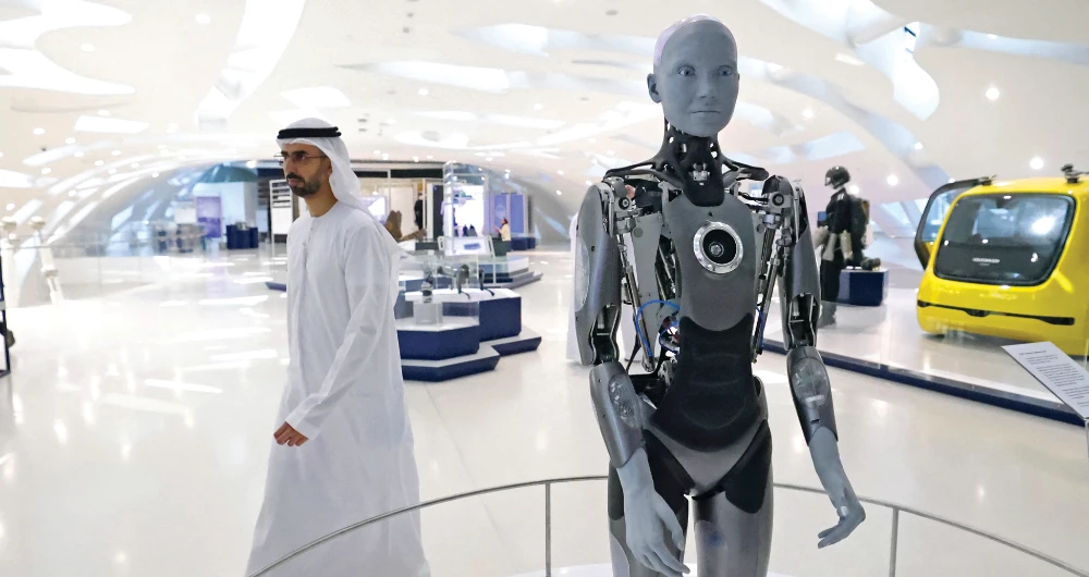 The AI-powered Ameca, made by the UK-based engineered Arts and described as a perfect platform for human-robot interaction, greets visitors at Dubai’s Museum of the Future. (AFP)