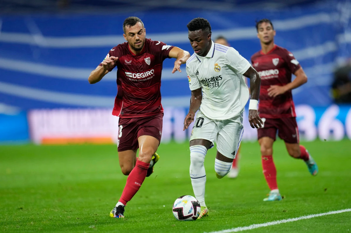 Real Madrid sans Benzema beat Sevilla 3-1 to extend lead