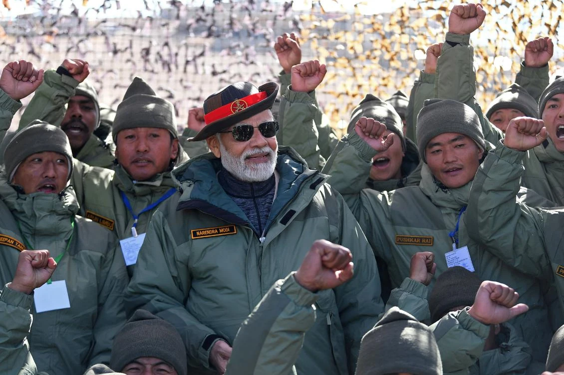 India’s Prime Minister Narendra Modi celebrates Diwali, the Hindu festival of lights, with the members of Indian armed forces in Kargil, Ladakh, India, Oct. 24, 2022. (AFP)