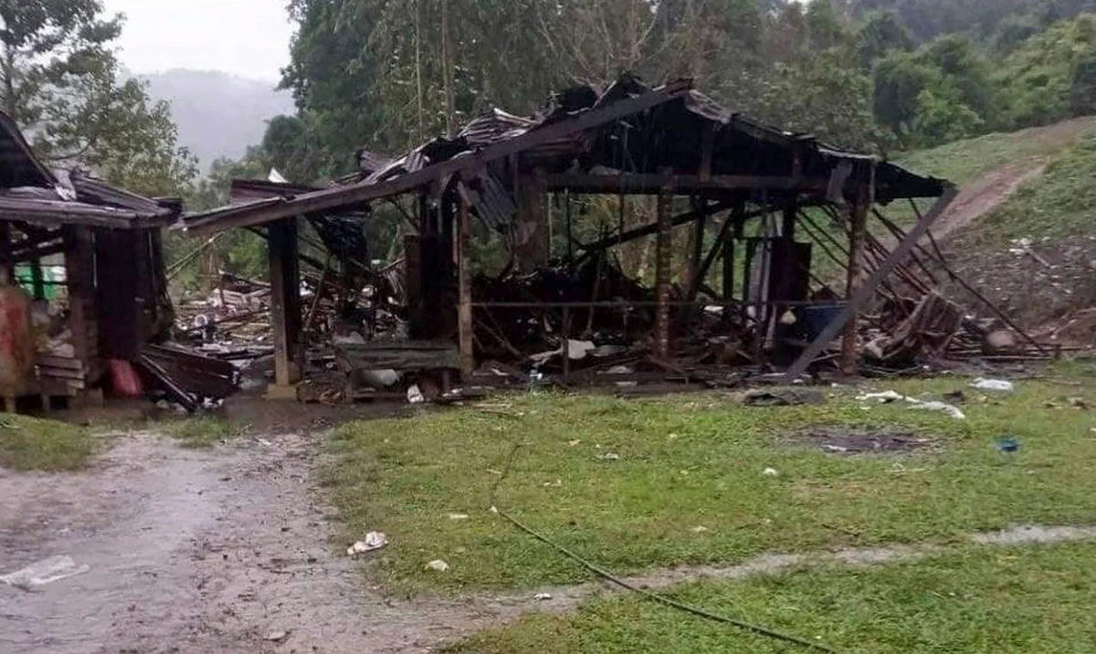 Debris are scattered around destroyed wooden structures near Aung Bar Lay Village, Hpakant township, Kachin state in Myanmar Monday, Oct. 24, 2022. (AP)