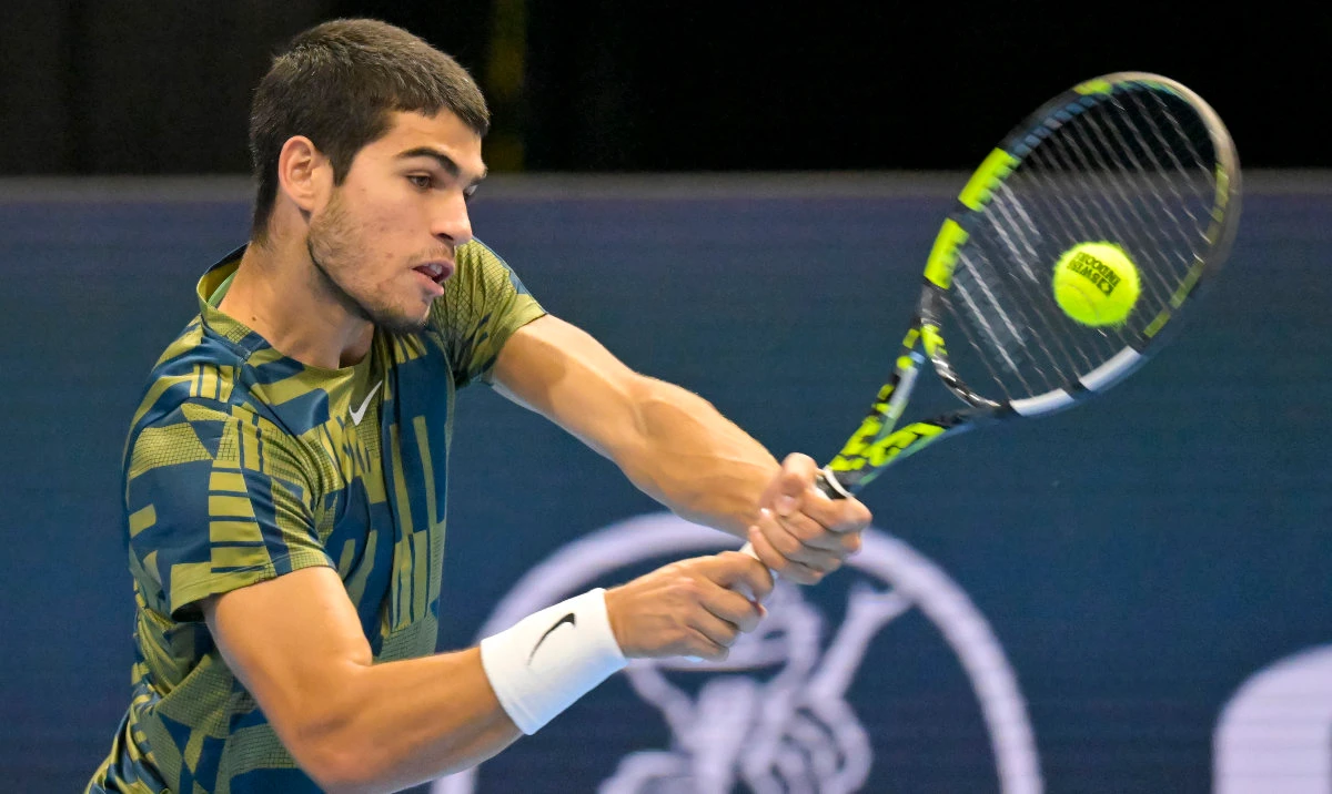 Spain's Carlos Alcaraz returns a ball to Botic van de Zandschulp from the Netherlands during their round of 16 match at the Swiss Indoors tennis tournament at the St. Jakobshalle in Basel, Switzerland, Wednesday. (AP)