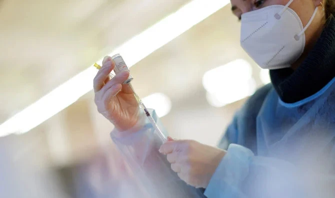 A nurse prepares a booster dose of the Moderna COVID-19 vaccine. (Reuters/File)