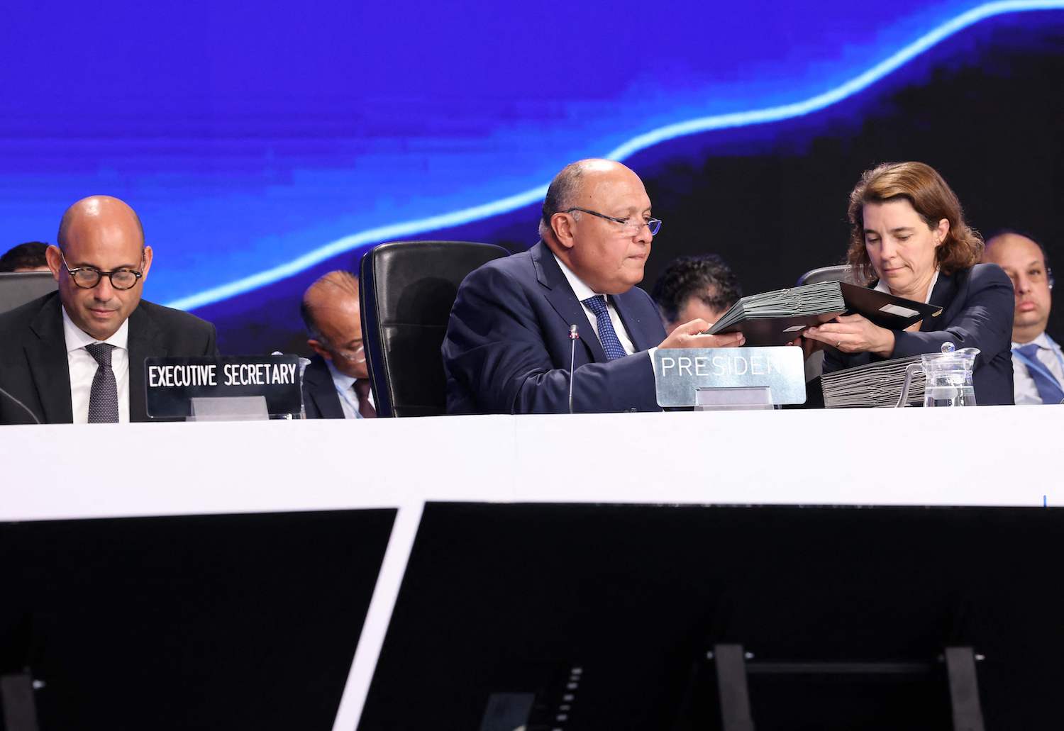 Egypt’s Foreign Minister Sameh Shukri speaks during the closing session of the COP27 climate conference. (AFP)