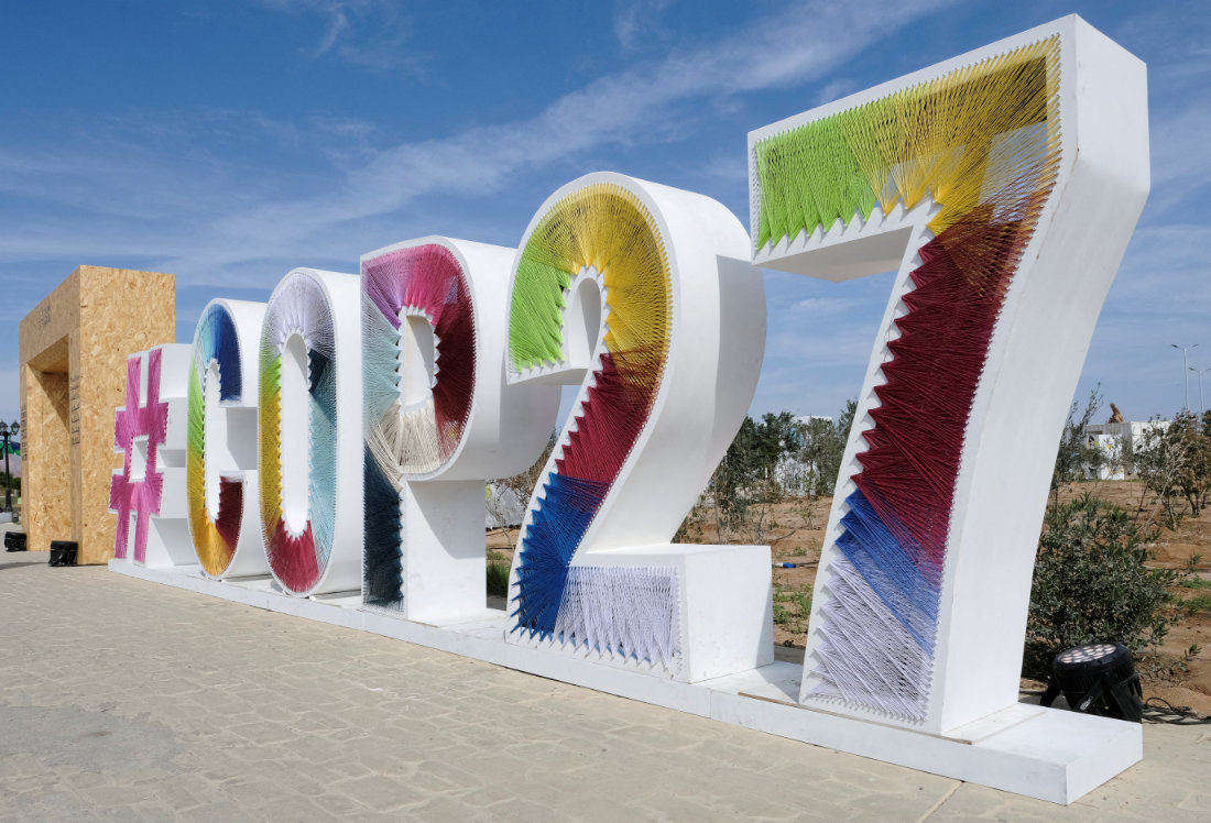 COP27 sign is seen at the Green Zone at the UN climate summit in Red Sea resort of Sharm El-Sheikh, Egypt. (Reuters)