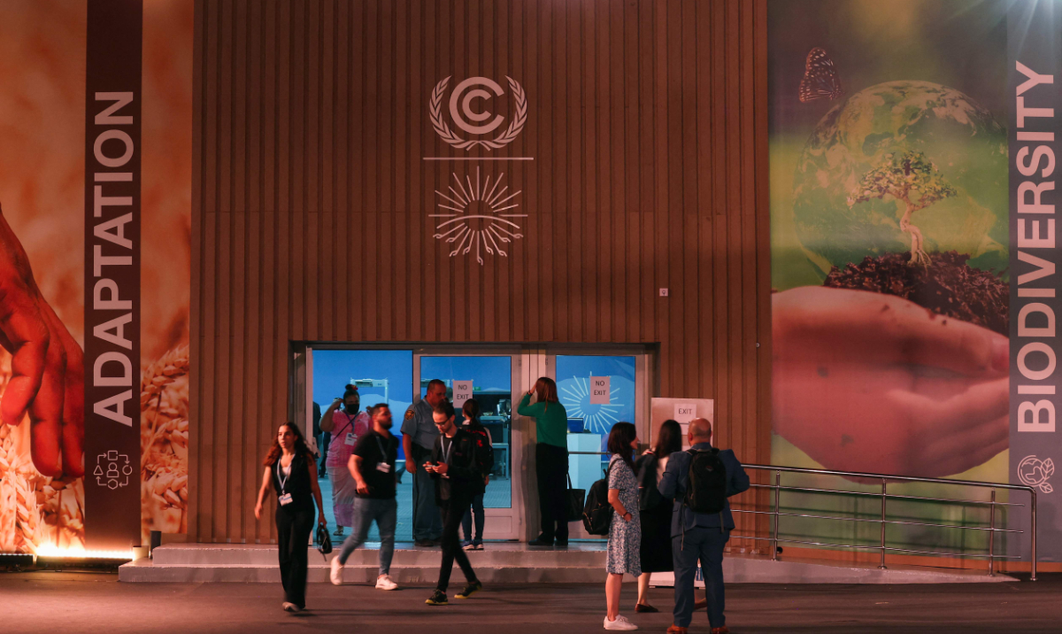 Participants gather at the Sharm El-Sheikh International Convention Centre on the first day of the COP27 climate summit. (AFP)