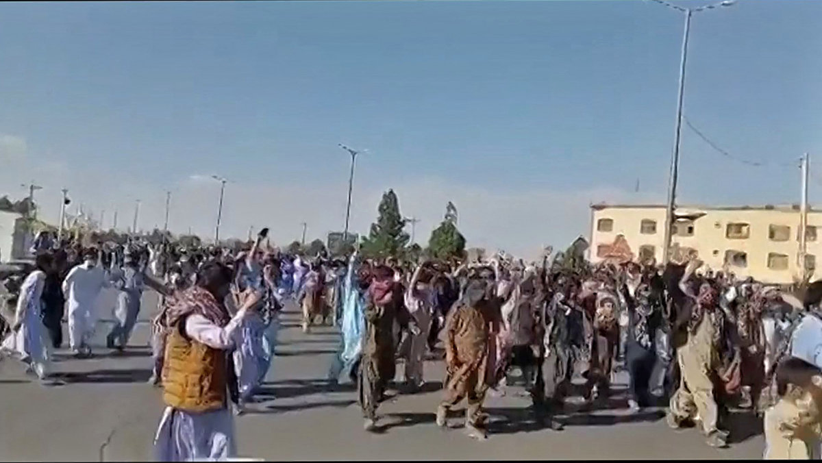This image grab from a UGC video posted on Nov. 11, 2022, shows Iranians protesting in Khash, Sistan-Baluchistan province. (AFP)
