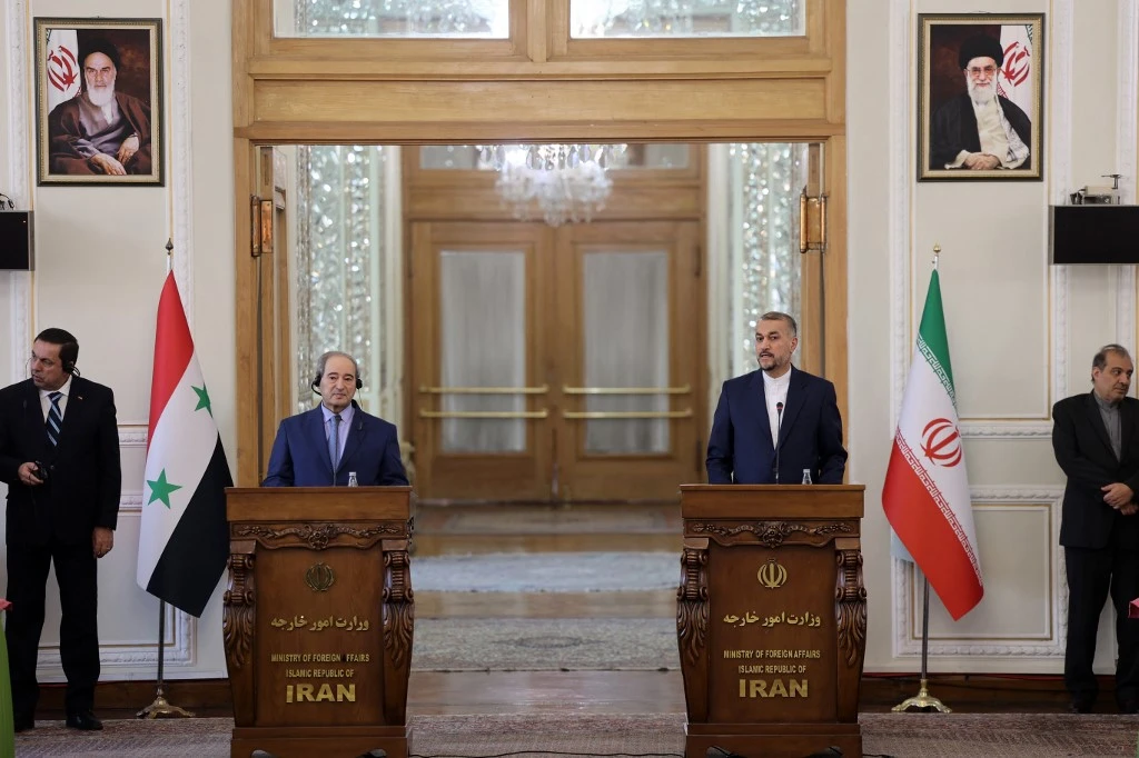 Syria's and Iran's Foreign Ministers, Faisal Mekdad and Hossein Amir-Abdollahian, during a joint press conference (File/AFP)