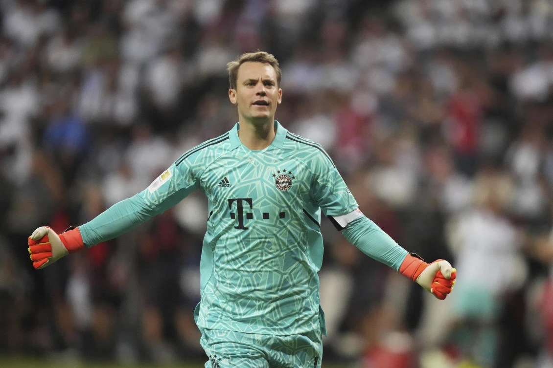 Bayern Munich and Germany goalkeeper Manuel Neuer says he was previously treated for skin cancer and had to undergo surgery. He has a scar near his nose. (AP)