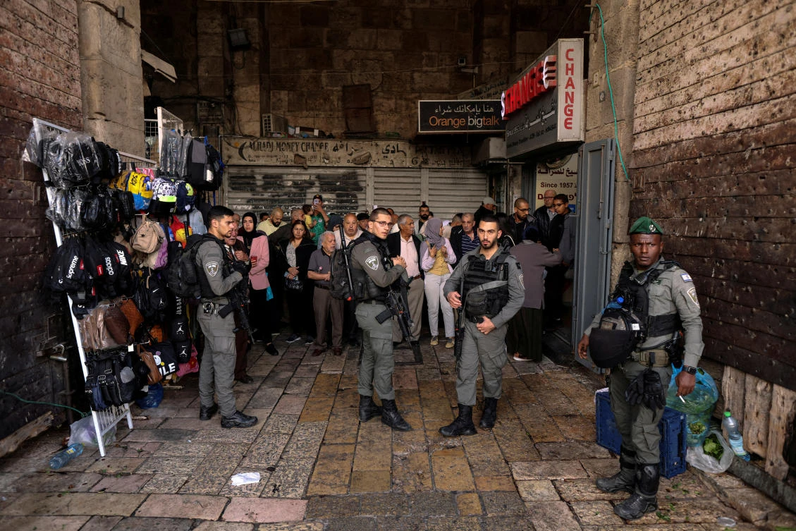 Israeli border police are seen in the area of a stabbing incident by a Palestinian man in Jerusalem’s Old City on Thursday. (Reuters)