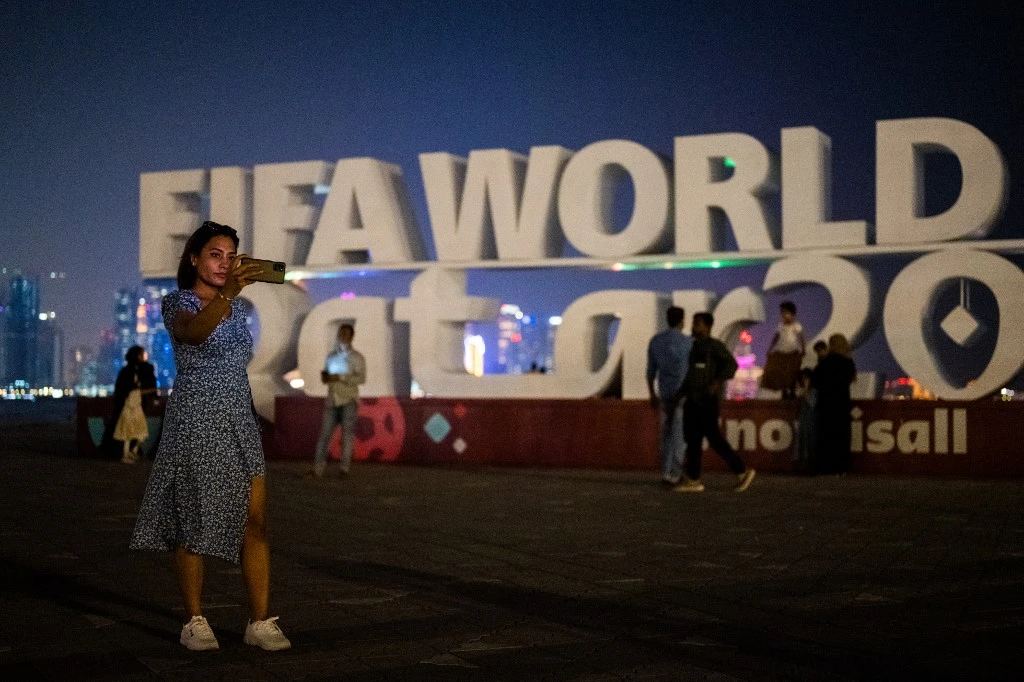 Fan groups from England and Wales are taking part in the Fan Leader Program for the FIFA World Cup in Qatar. (AFP)