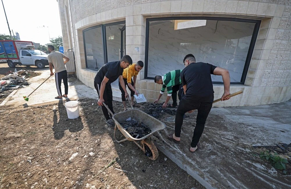 Israel fires missiles at Hamas military training camp in Gaza in reply to rocket attack
