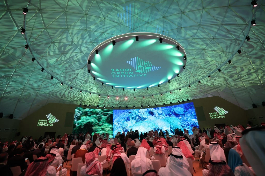 Above, attendees at the opening ceremony of the Saudi Green Initiative forum on Oct. 23, 2021, in the Saudi capital Riyadh. (AFP)