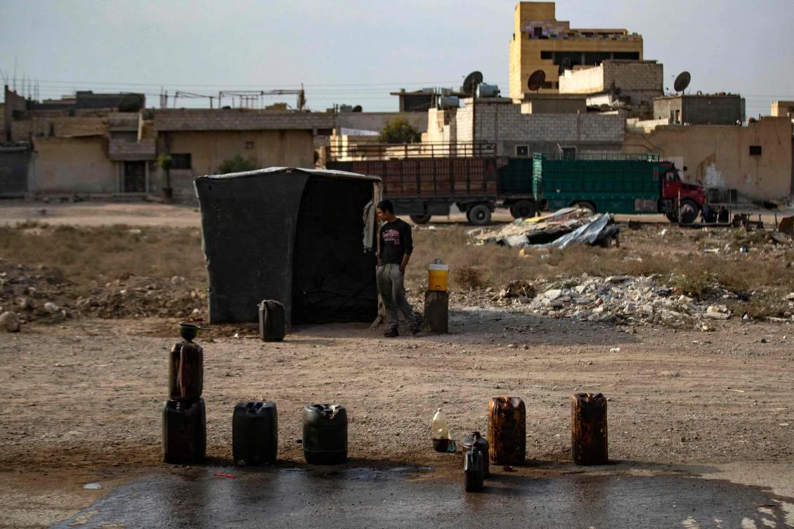The Deir Ezzor 24, an activist collective, reported three airstrikes targeting Iran-backed militias in the Syrian border town of Boukamal. (File/AFP)