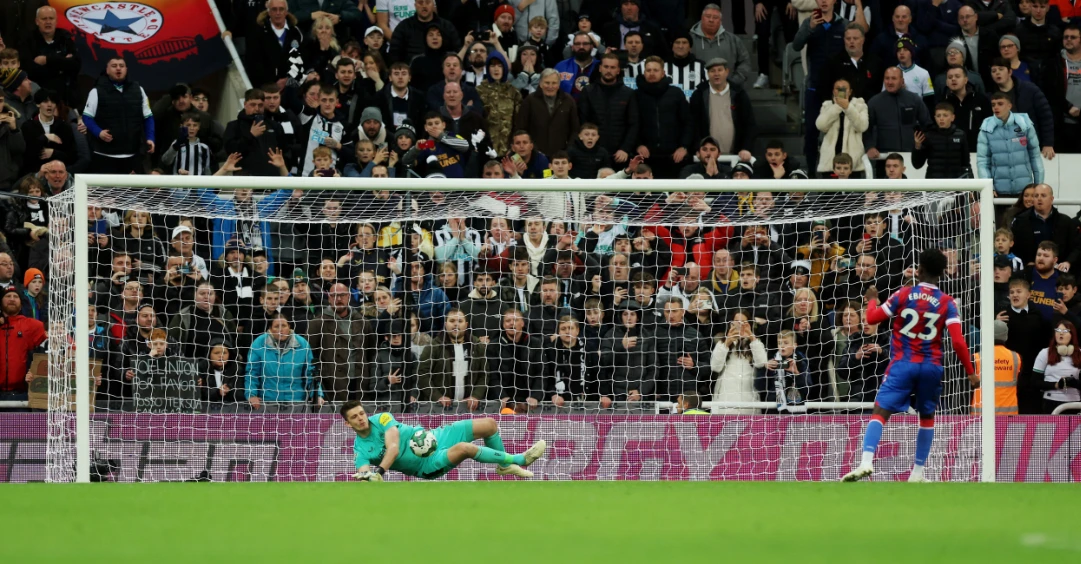 Newcastle United's Nick Pope saves the decisive penalty from Crystal Palace's Malcolm Ebiowei in the penalty shootout on Wednesday. (Reuters)