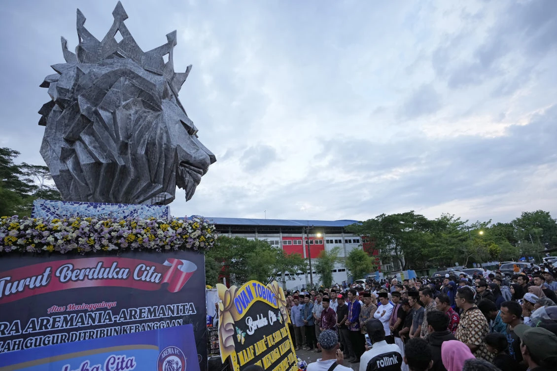 A stampede at Kanjuruhan football stadium, after police fired tear gas at a domestic league match, left 135 people dead last month. (AP)