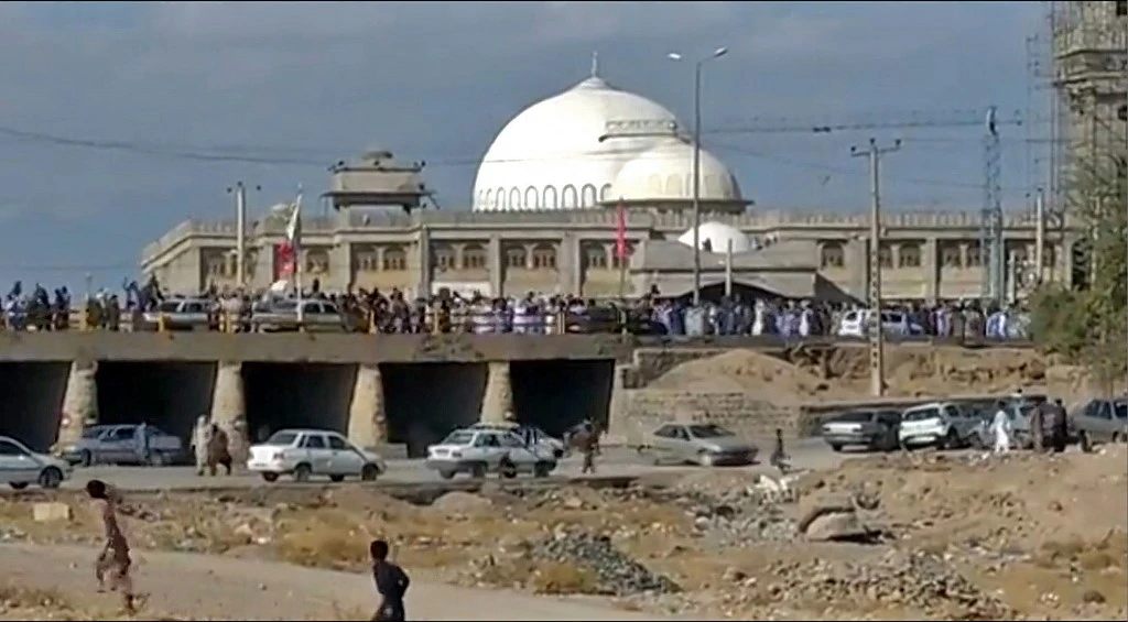 Protesters march in Khash of Iran’s southeastern province of Sistan-Baluchistan in this image grab from a UGC video. (UGC/AFP)