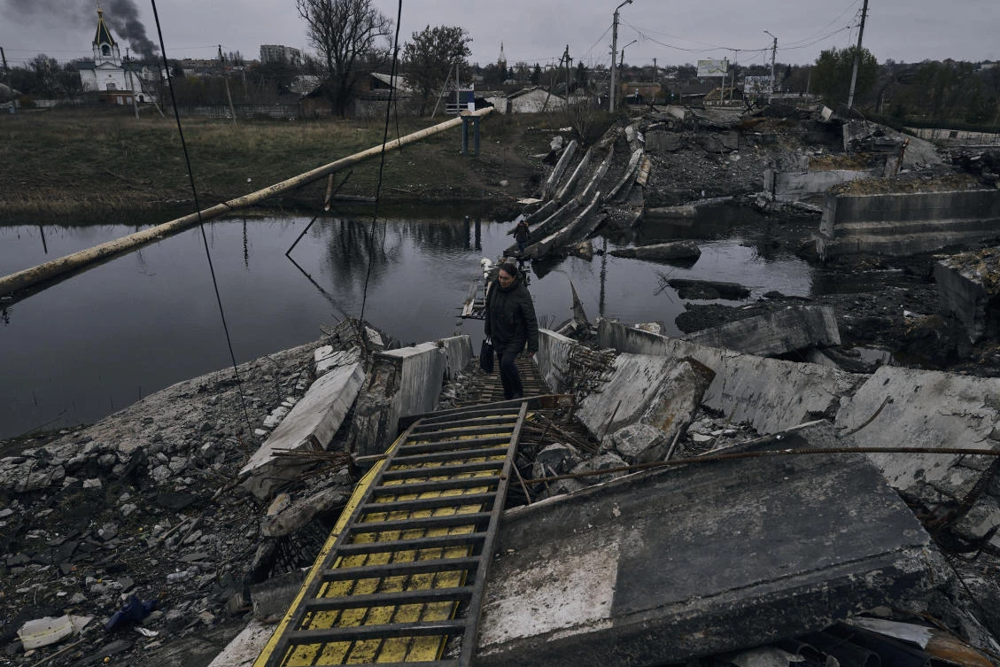 Russian forces destroyed key infrastructure in Ukraine’s southern city of Kherson before fleeing. (AP)