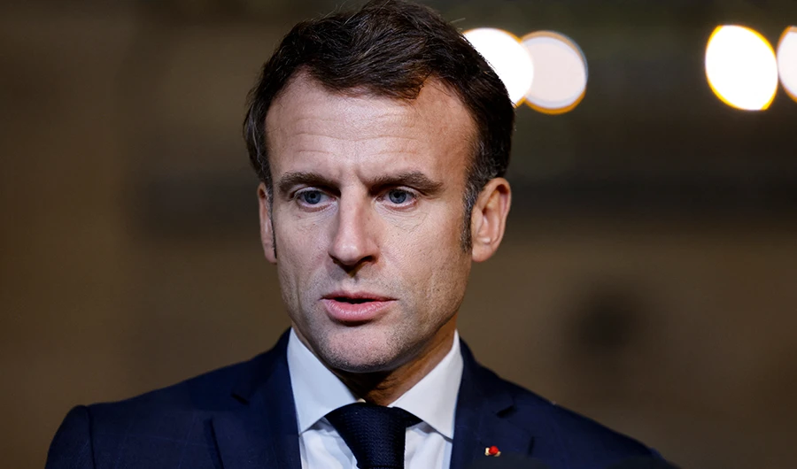 French President Emmanuel Macron addresses a joint statement with the President of Argentina prior to a meeting at the Elysee palace as part of the Paris Peace Forum, in Paris, on November 10, 2022. (AFP)