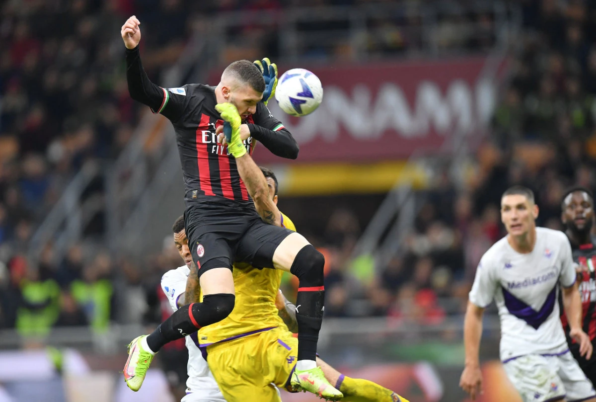 AC Milan's Ante Rebic in action before Fiorentina's Nikola Milenkovic scores an own goal and AC Milan second goal on Sunday. (Reuters)