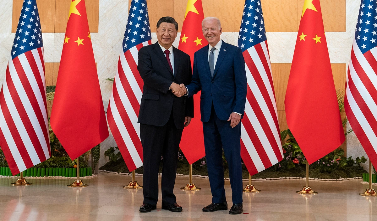 US President Joe Biden, right, and Chinese President Xi Jinping shake hands before a meeting on the sidelines of the G20 summit meeting, on November 14, 2022, in Bali, Indonesia. (AP)