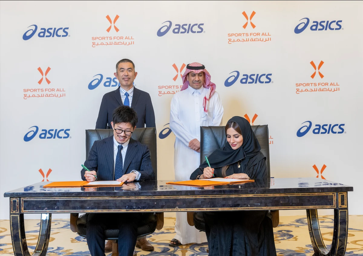 SFA Managing Director Shaima Saleh Al-Husseini and Mano Takayuki, general manager of ASICS Arabia, signed the partnership agreement. (Supplied)