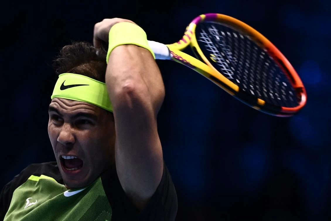 Spain’s Rafael Nadal returns to USA’s Taylor Fritz during their first round-robin match at the ATP Finals tennis tournament on November 13, 2022 in Turin. (AFP)
