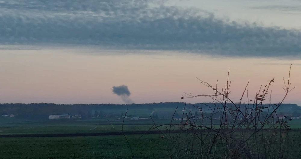 Smoke rises in the distance, amid reports of two explosions, seen from Nowosiolki, Poland, near the border with Ukraine November 15, 2022 in this image obtained from social media. (Reuters)