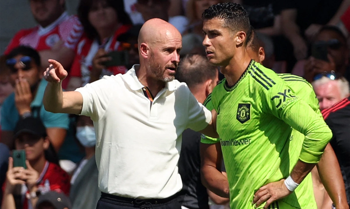 In this file photo taken on Aug. 27, 2022 Manchester United's Dutch manager Erik ten Hag directs substitute Manchester United's Portuguese striker Cristiano Ronaldo during the English Premier League match against Southampton. (AFP)