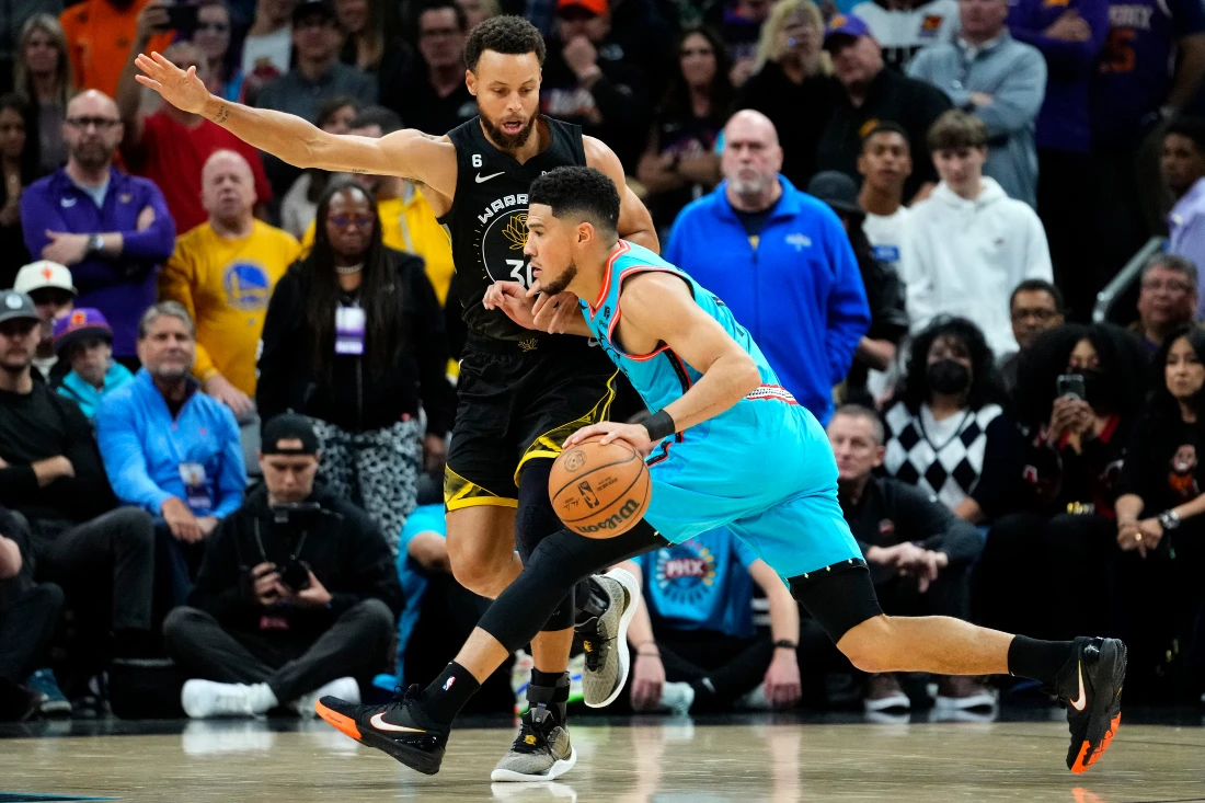 Payne, Booker help Suns overcome Curry’s 50-point night