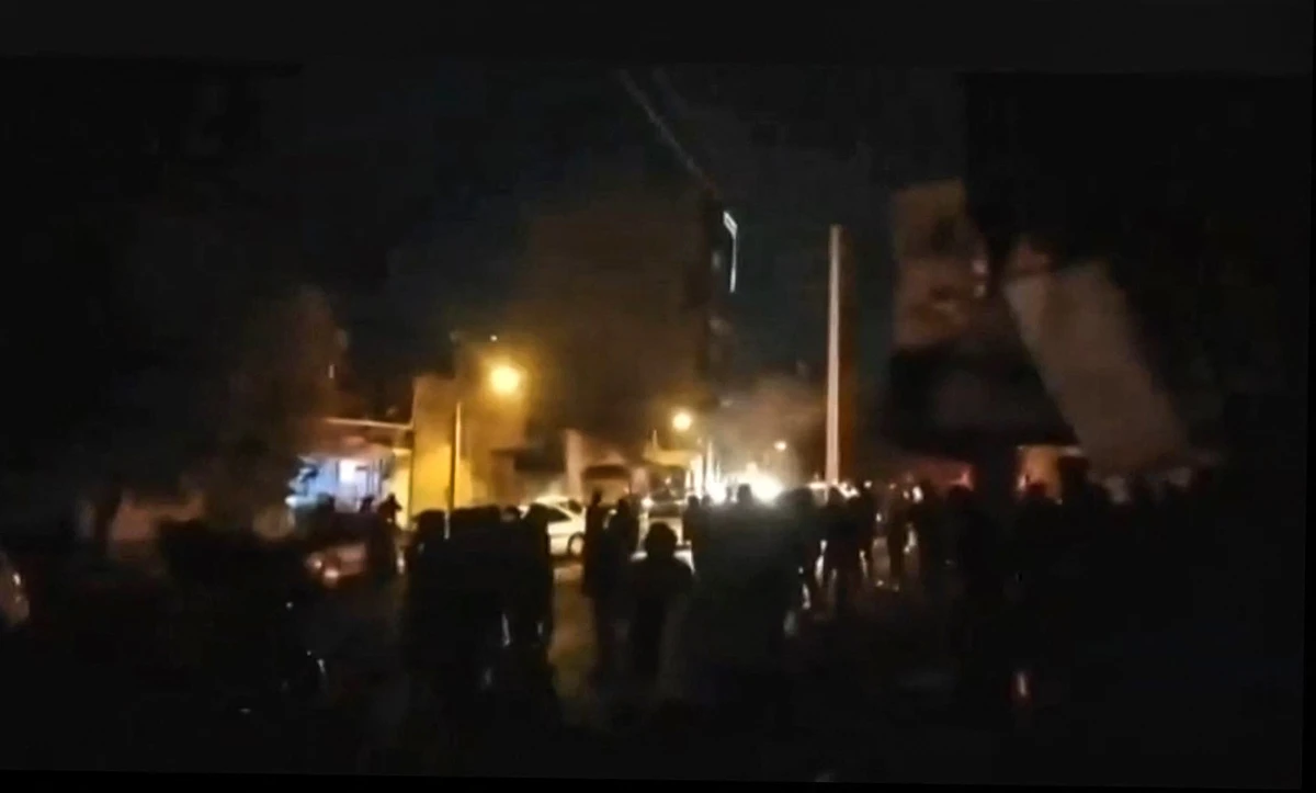 The old home of the regime’s founder Ayatollah Khomeini was set on fire as protestors chanted slogans demanding the end of the regime. (AFP)