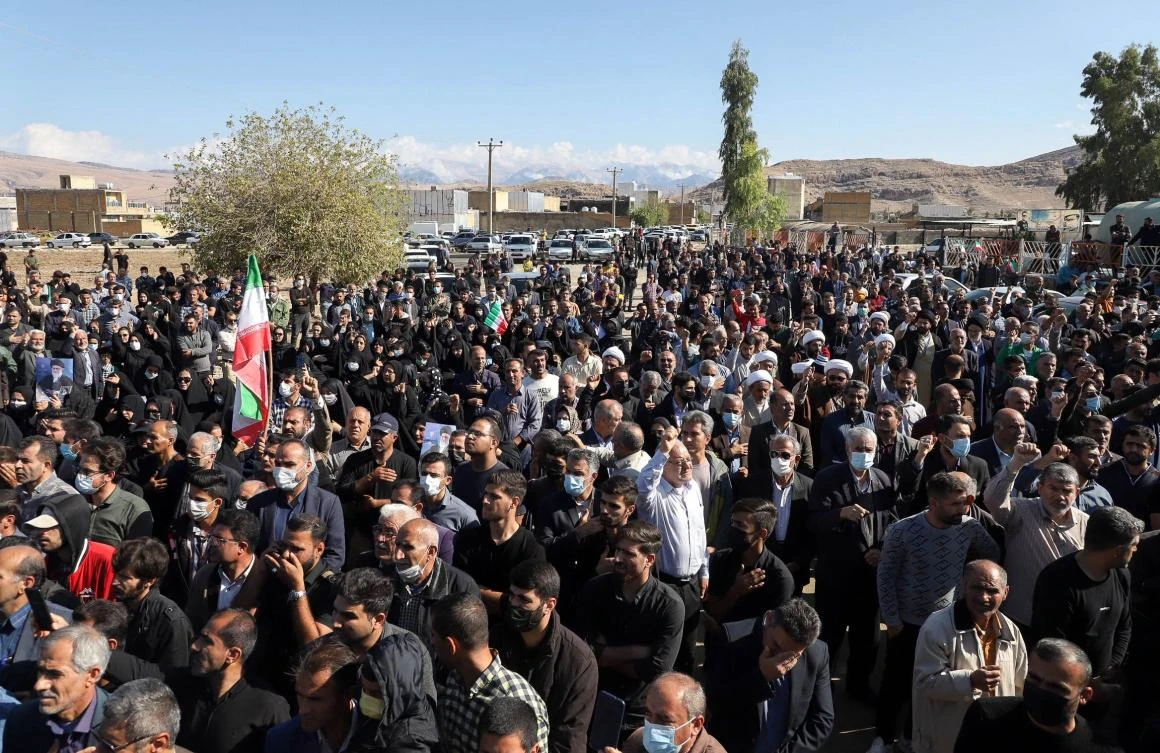 Iranians protest at funeral for child killed in shooting