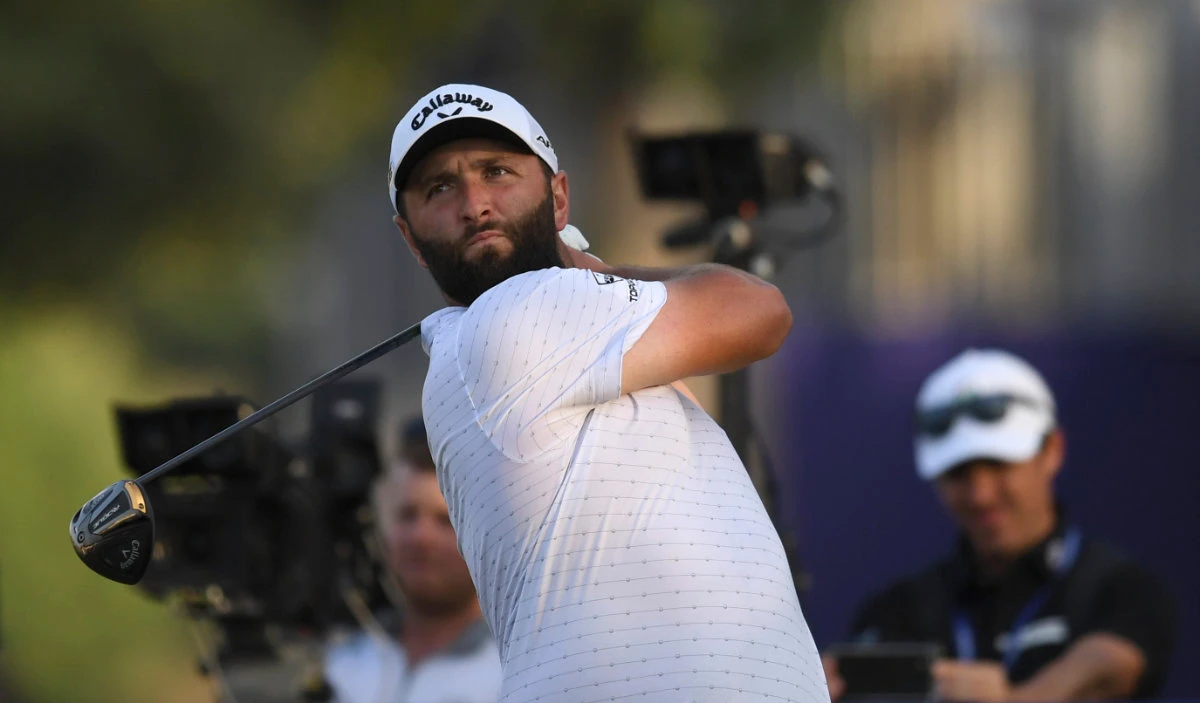 Jon Rahm of Spain tees off at the 18th hole during the third round of the DP World Tour Championship in Dubai Saturday. (AP )