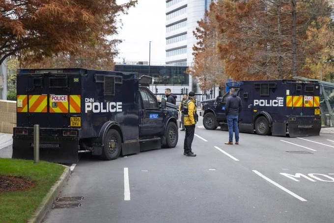 Police cars and rifle-armed security stood guard outside Iran International’s bureau in Chiswick, west London on Saturday. (Supplied)